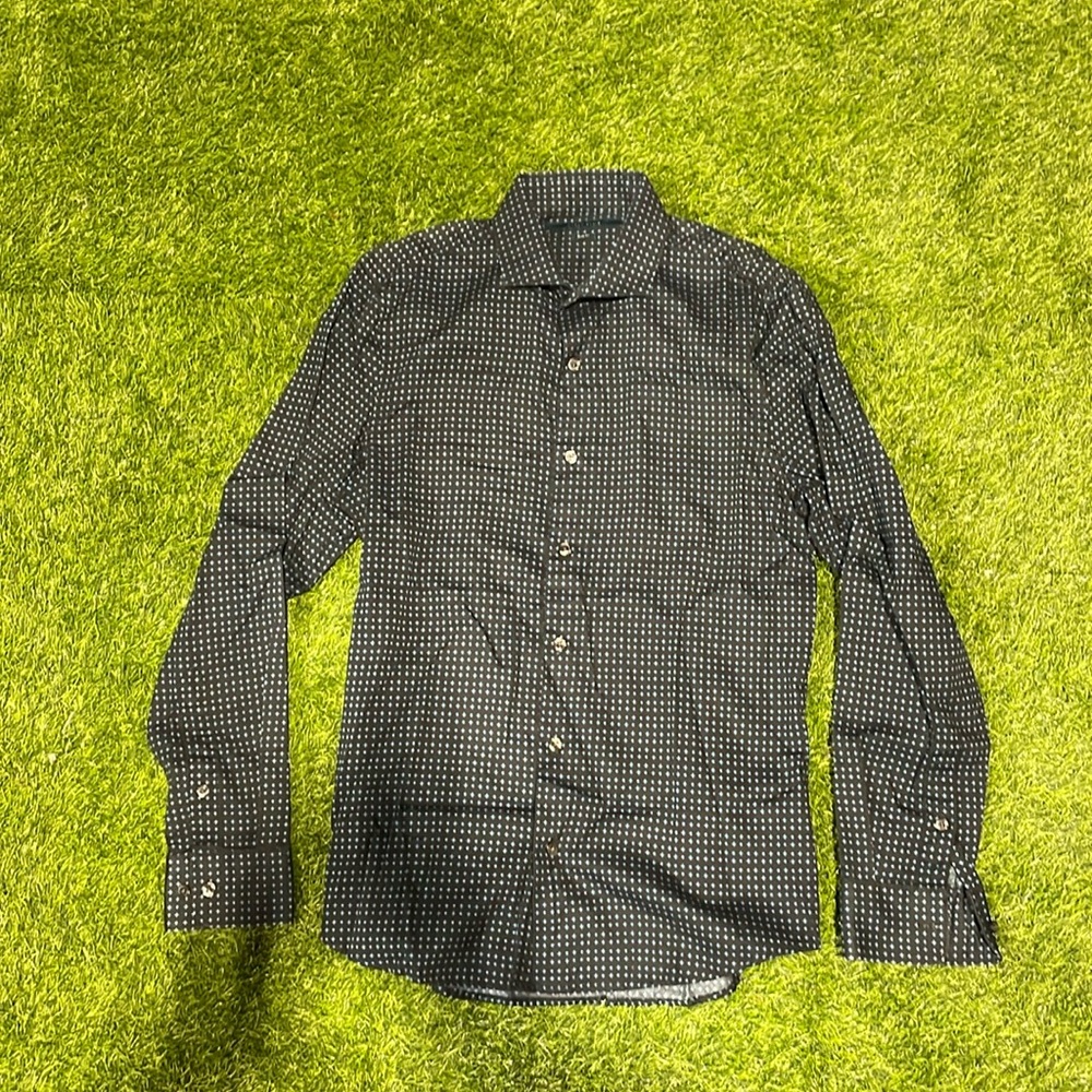 Men’s black with blue diamond pattern long sleeve dress shirt.